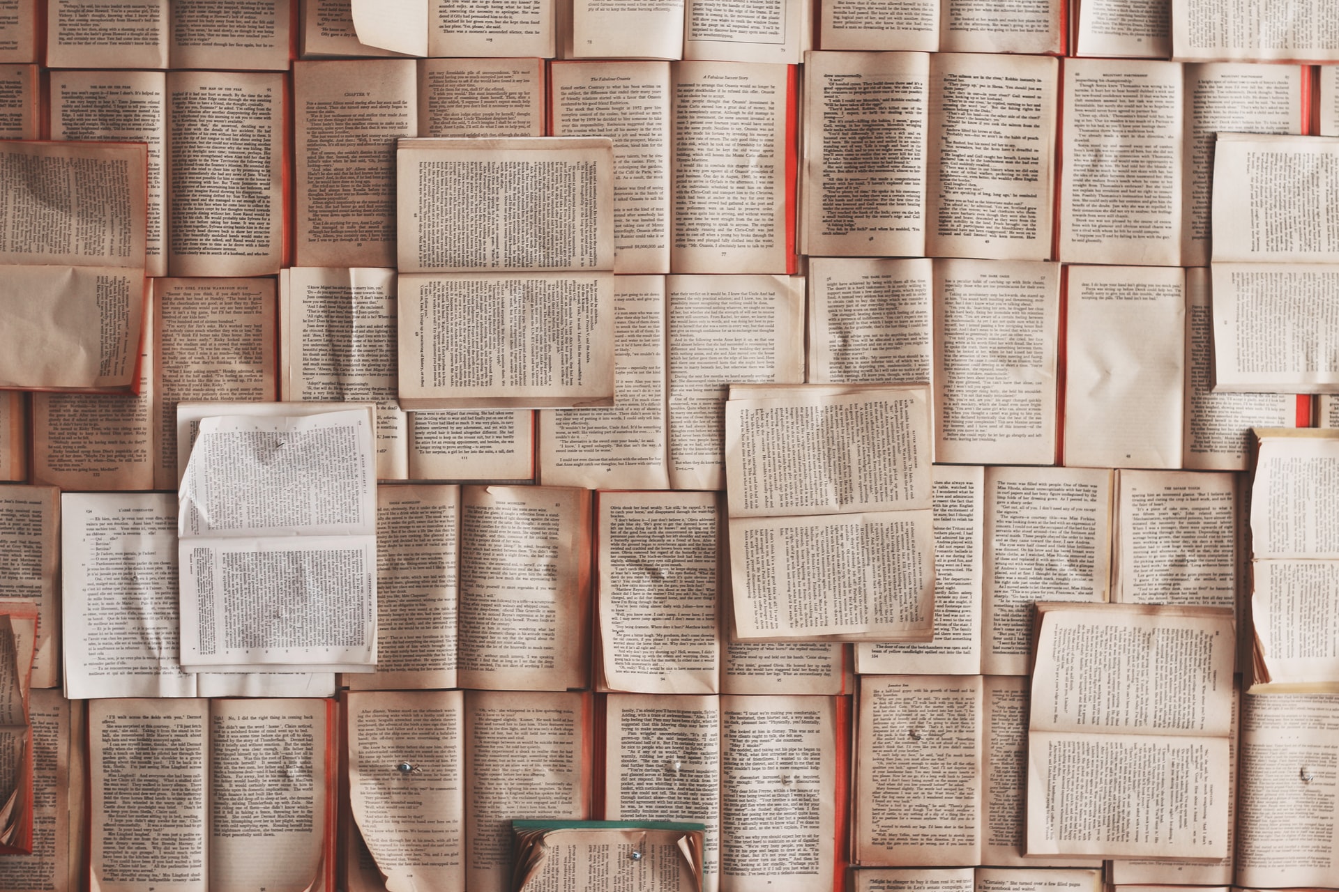 Open books, representing the idea of reviewing decisions and reconsidering them from scratch