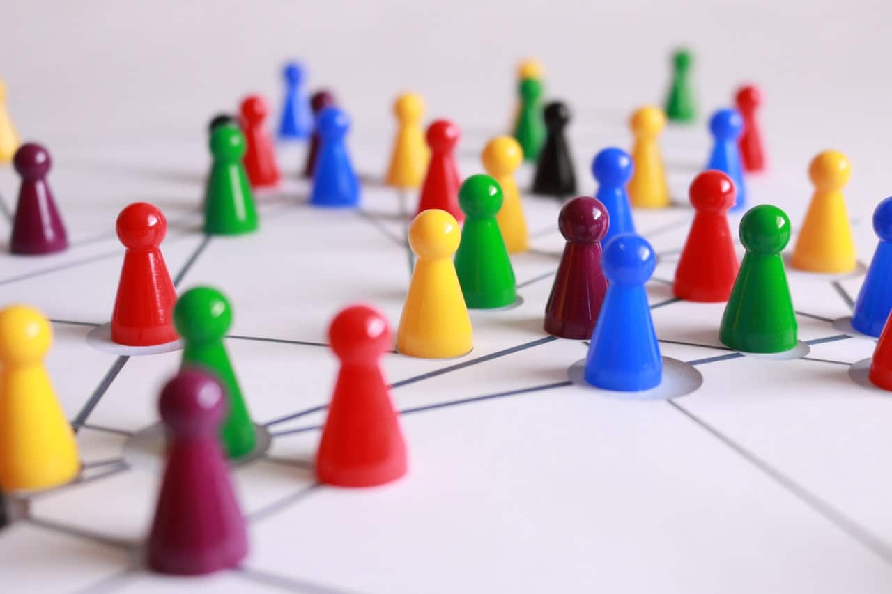 Multicoloured game pieces representing children and how the changes in the Divorce Act will affect them