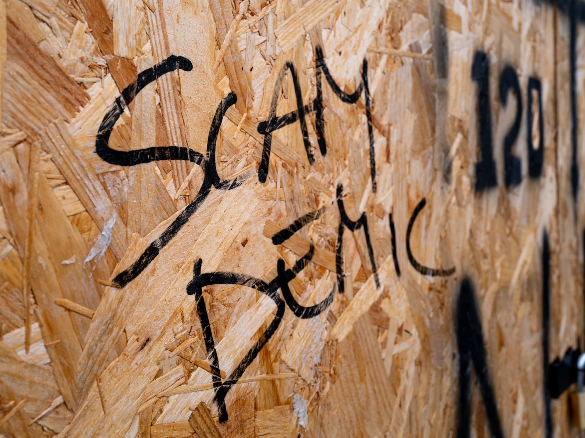 COVID conspiracy graffiti representing how an anti-mask stance recently affected a custody case