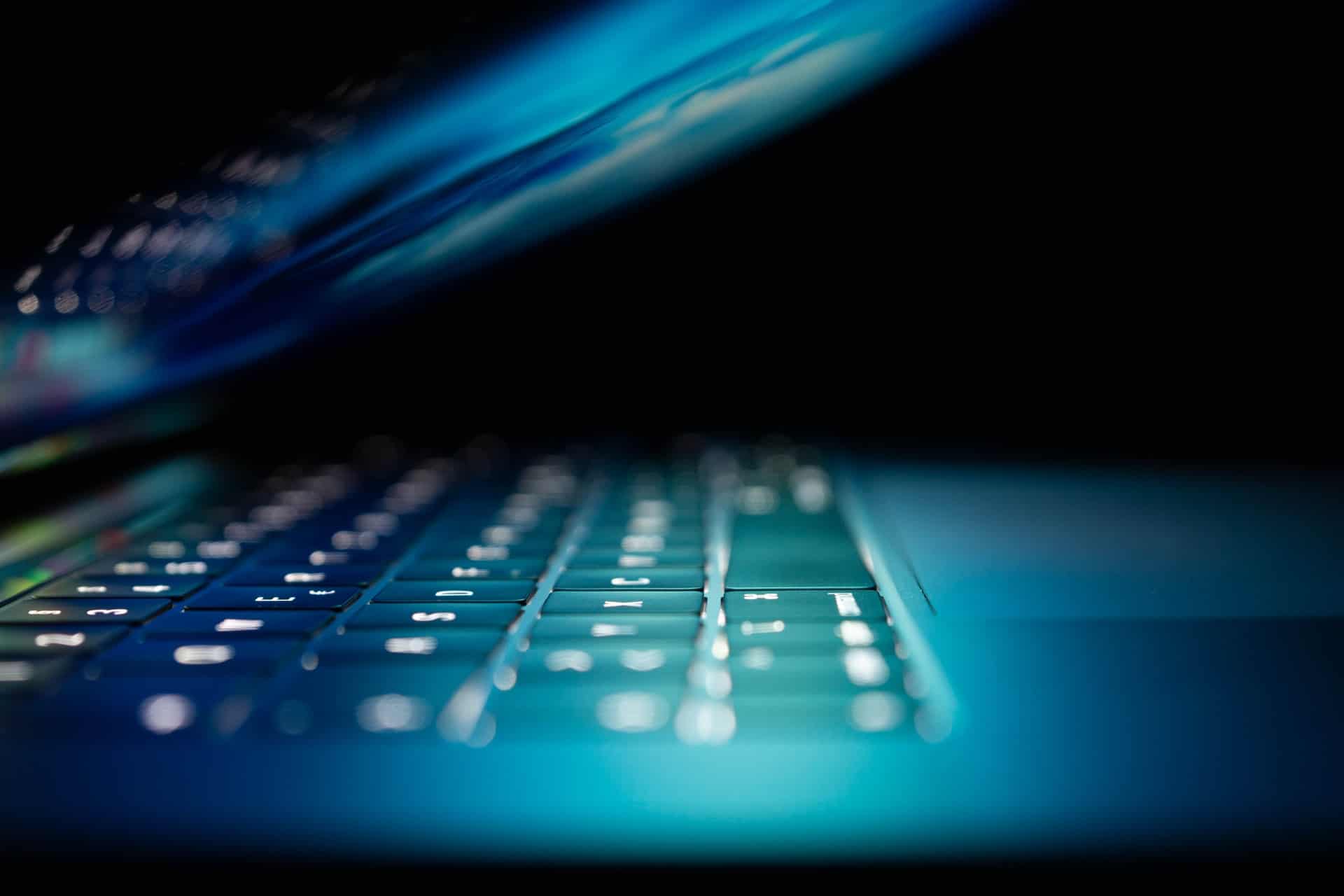 A laptop representing online harassment and revenge porn