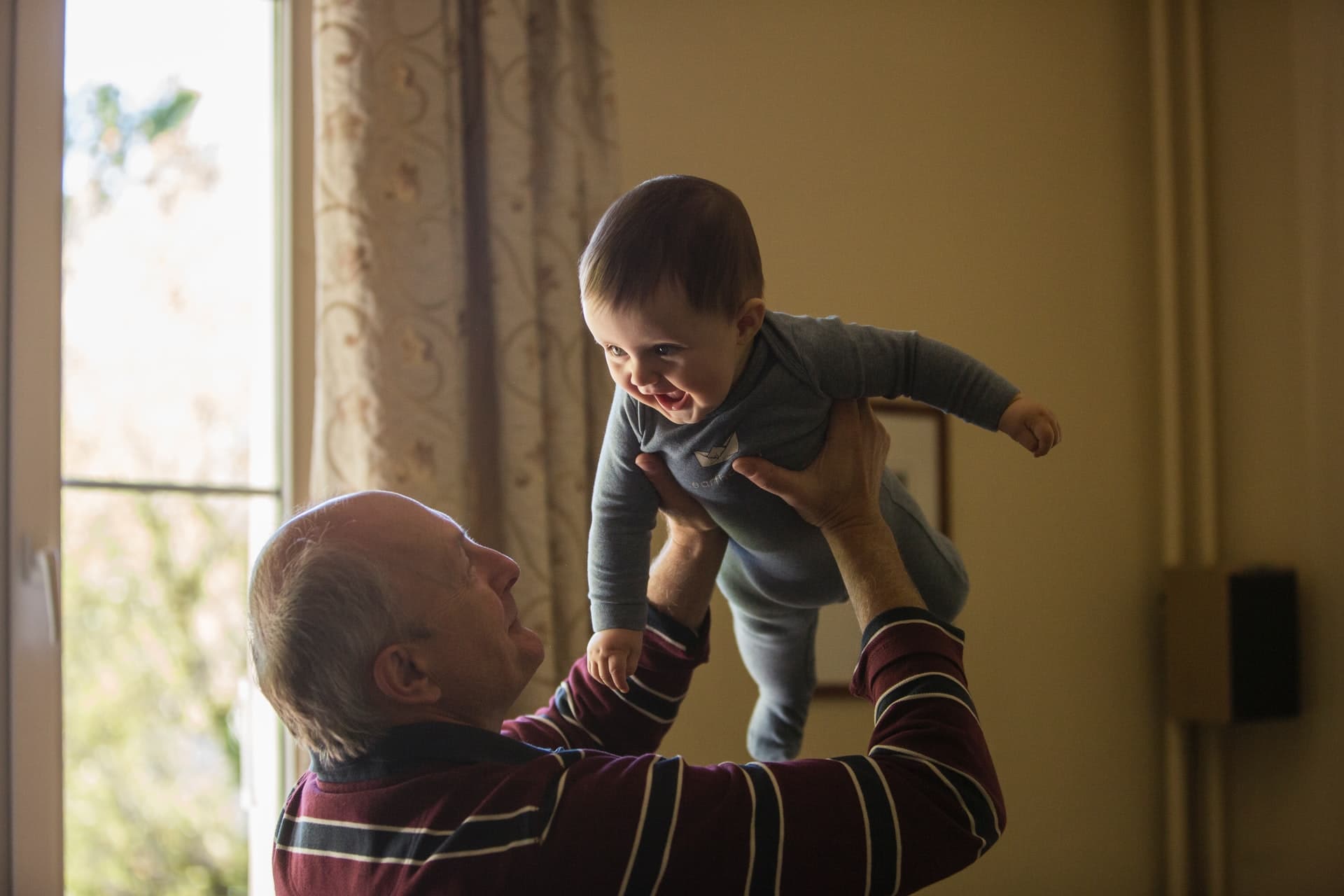 a grandfather with his infant grandson representing a potential roadblock in contact order applications