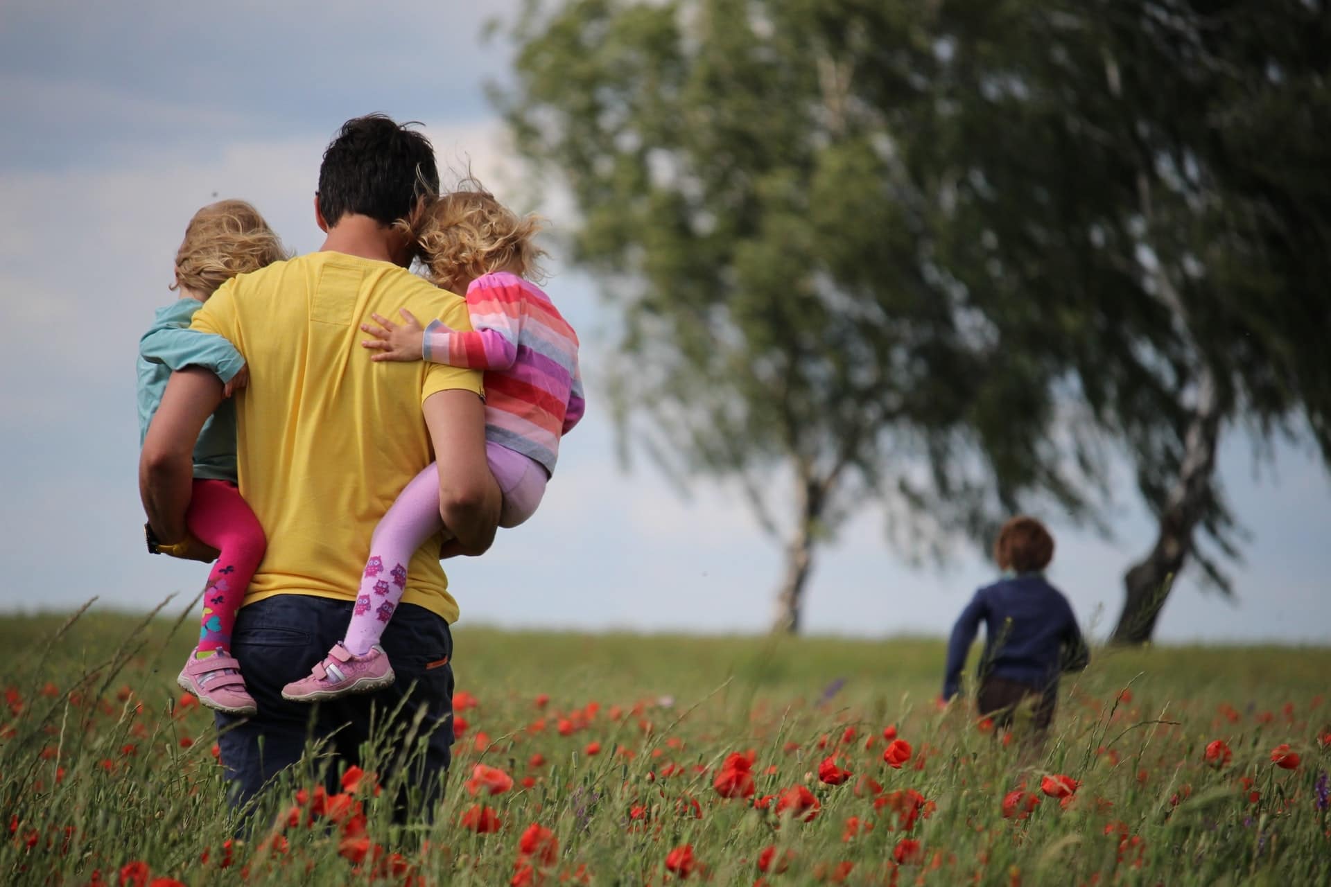 A father and his kids representing a case in which a judge questioned a father's mental fitness without reason