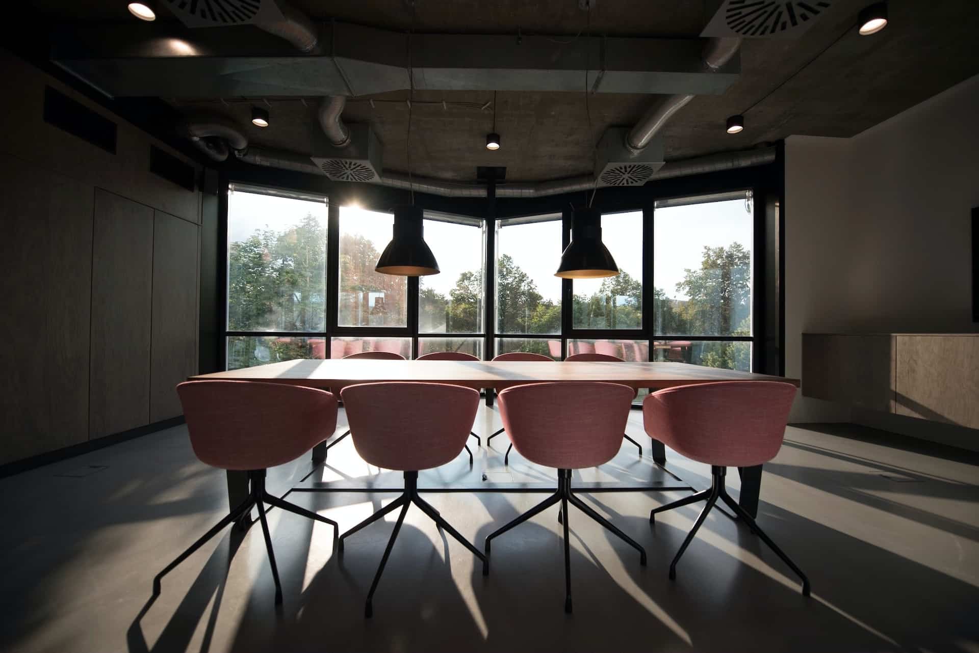 pink dining table with four chairs