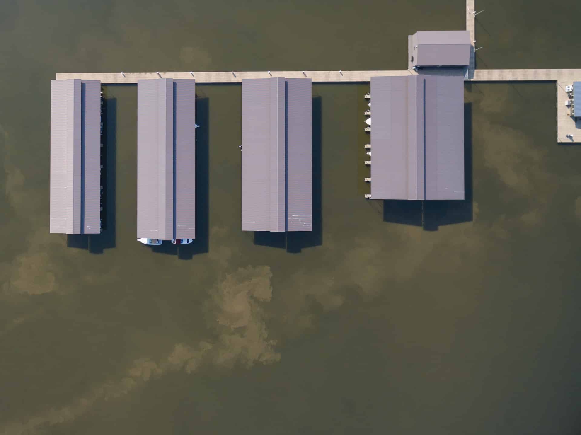 aerial photography of gray roof boathouses