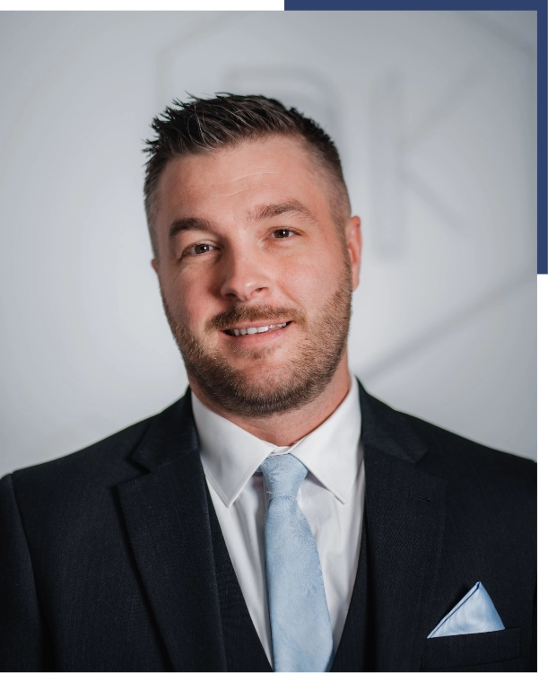 Carl headshots main bio image blue bg